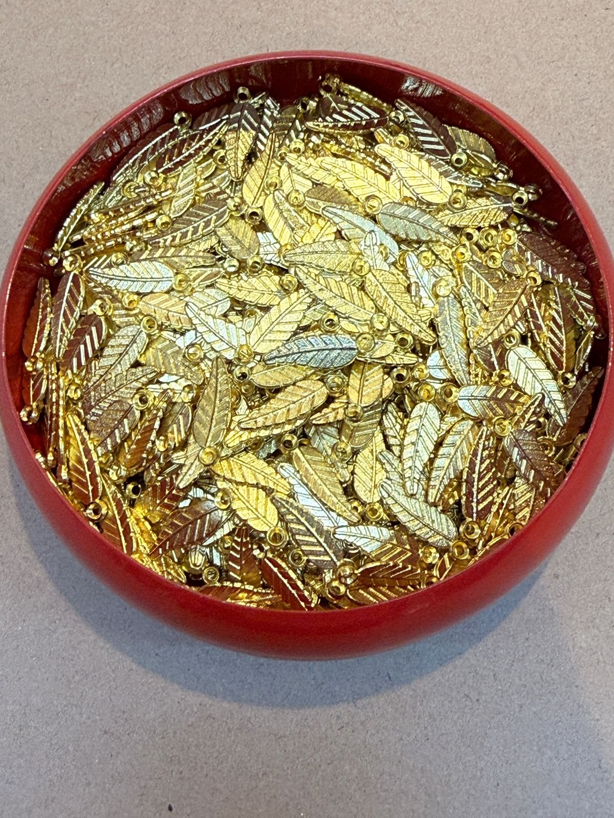 WhatsApp Image 2026-01-21 at 7.12.42 PM Golden Leaf one Hole Sewing - 15gm